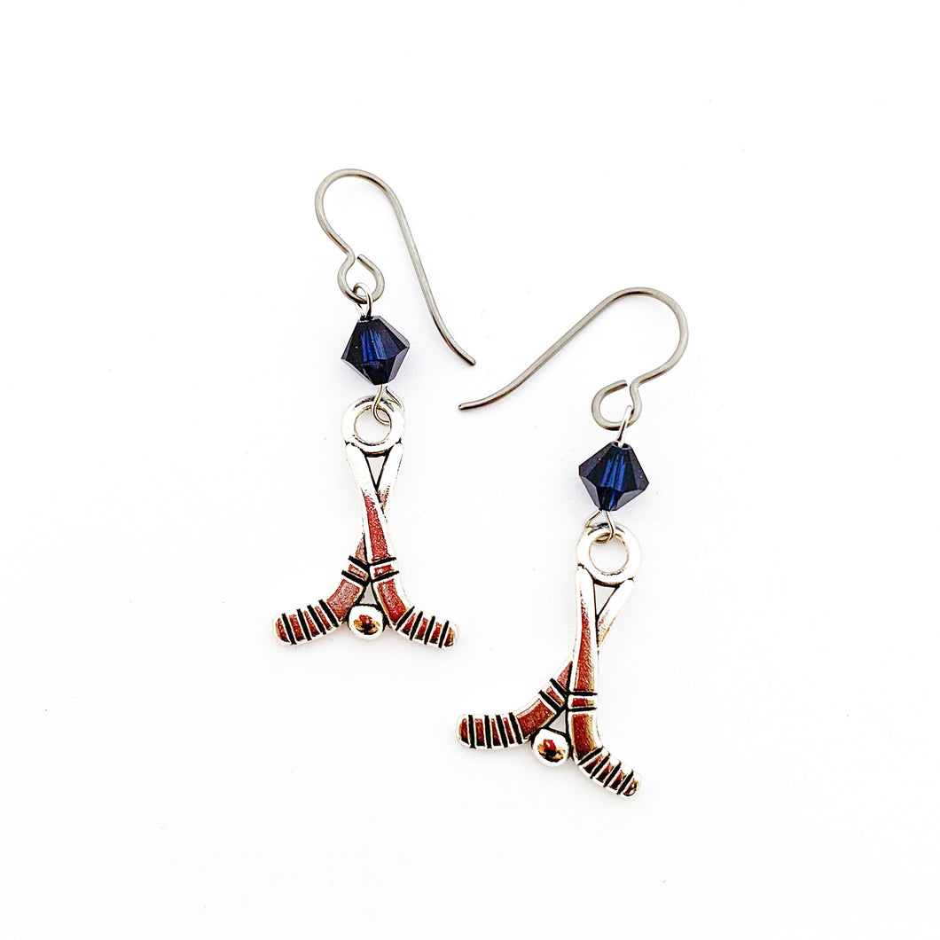 silver hockey charm earrings with navy blue Swarovski crystal bead accents