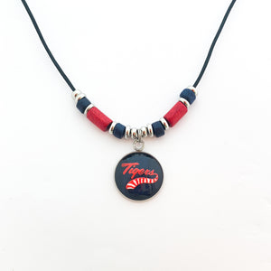 custom stainless steel South Panola pendant with red and navy Greek ceramic beads