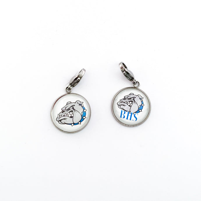 two stainless steel round zipper pulls with lobster clasps both featuring a Belgreen Bulldog logo in blue, black, and white