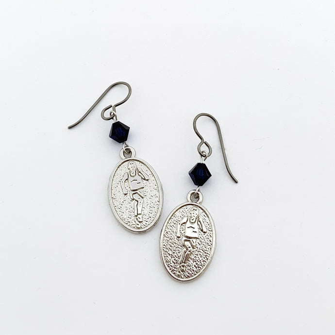 silver embossed runner charm earrings with black Swarovski crystal bead accents