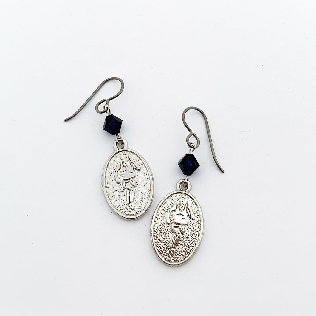 silver embossed runner charm earrings with black Swarovski crystal bead accents