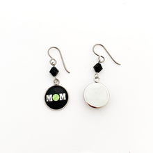 front and back view of tennis mom charm earrings with black swarovski crystal bead accents