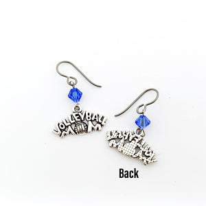 front and back view of silver volleyball mom charms with sapphire blue swarovski crystal bicone beads