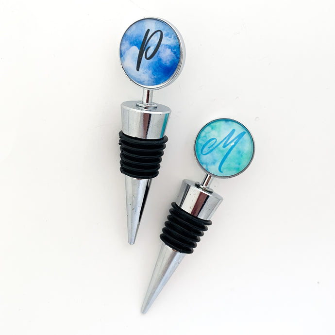 personalized wine stoppers with the letters P and M
